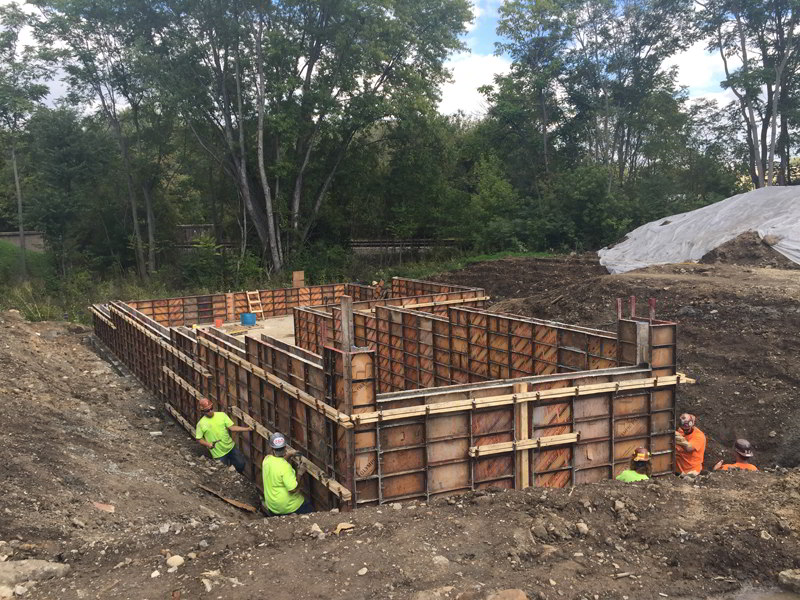 A group of men working on a construction site.