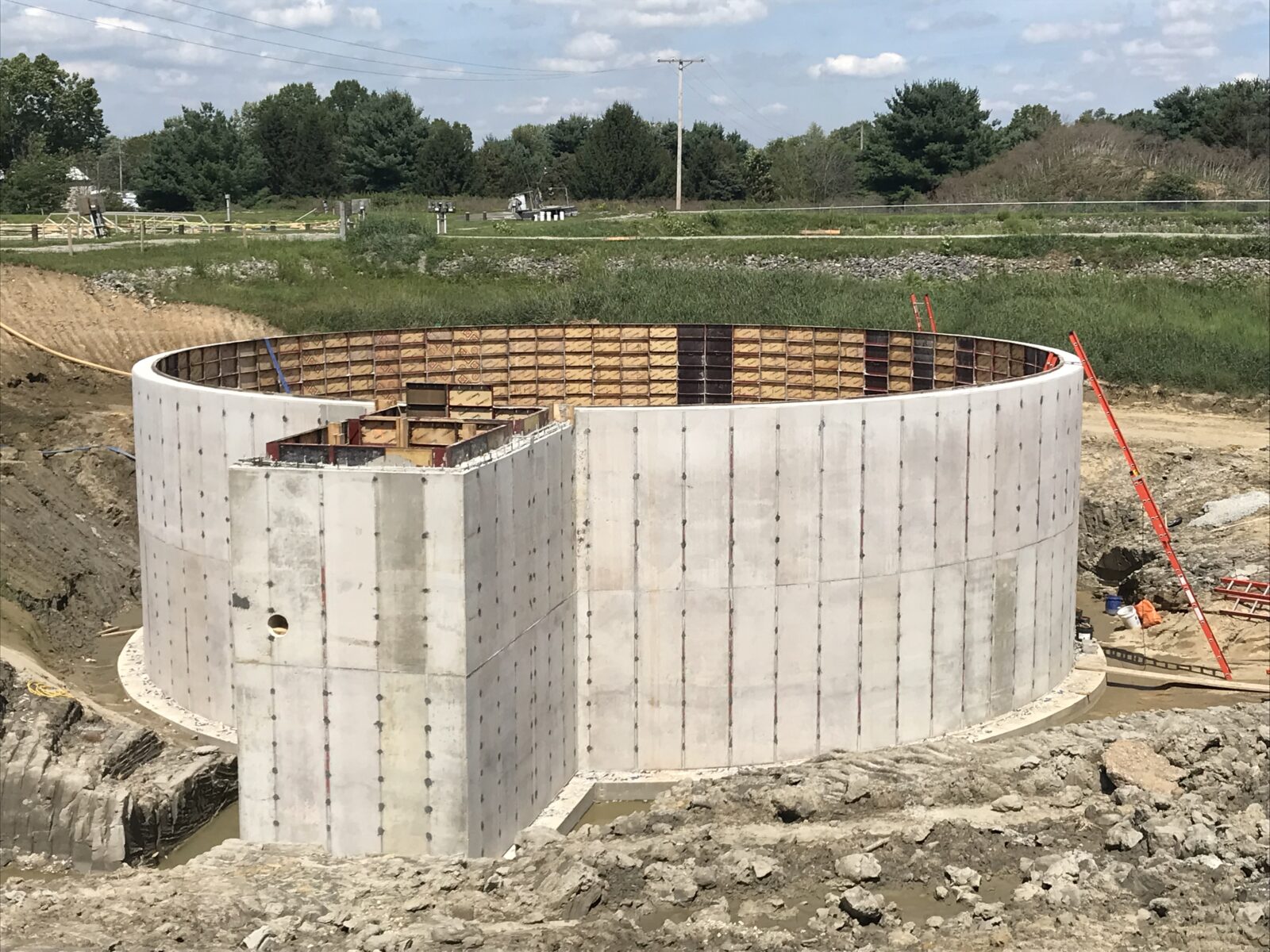 A concrete structure in a field.